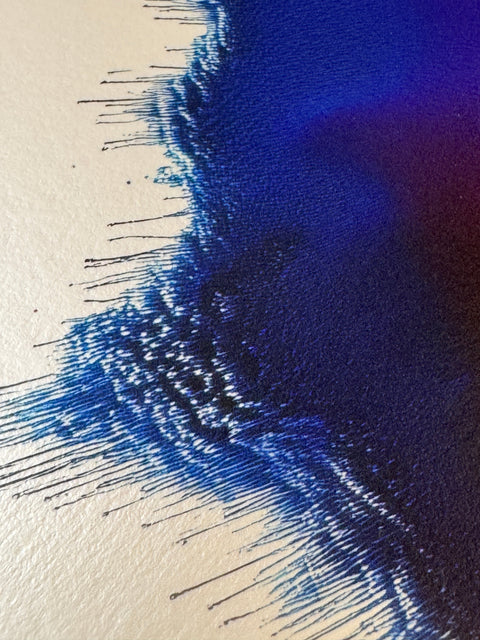 IMPACT 0018, close crop of the ragged edge showing dark navy-black fringe with fine dripping threads, against a strip of cream paper visible at the upper corner.
