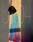 Home (2024 timed edition) by Kalle Hellzén shown as an iPhone lock screen