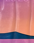 Phone lock screen showing a fragment from Kalle Hellzen's work for the Palma show, violet fading through peach to a dark teal ridge, as wallpaper.