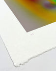 Detail of What Comes Back by Atelier Kalle Hellzén showing the hand-written edition number "1/5" on the lower deckle edge, beneath a corner of the print's orange-and-magenta field. Hand-signed and numbered Limited Edition of 5 on handmade kozo washi.