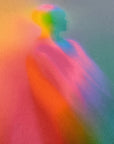 Close detail of What Comes Back by Atelier Kalle Hellzén, hand-signed and numbered Limited Edition of 5. The upper figure seen near full bleed, colour shifting from orange and pink to green and blue across the body, the paper fibre legible through the pigment. Giclée on handmade kozo washi.