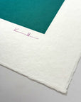 Detail of What Comes Back by Atelier Kalle Hellzén showing the artist's hand-drawn "KH" signature in pink on the lower deckle edge of the sheet, beside a band of teal from the print. Hand-signed and numbered Limited Edition of 5 on handmade kozo washi.