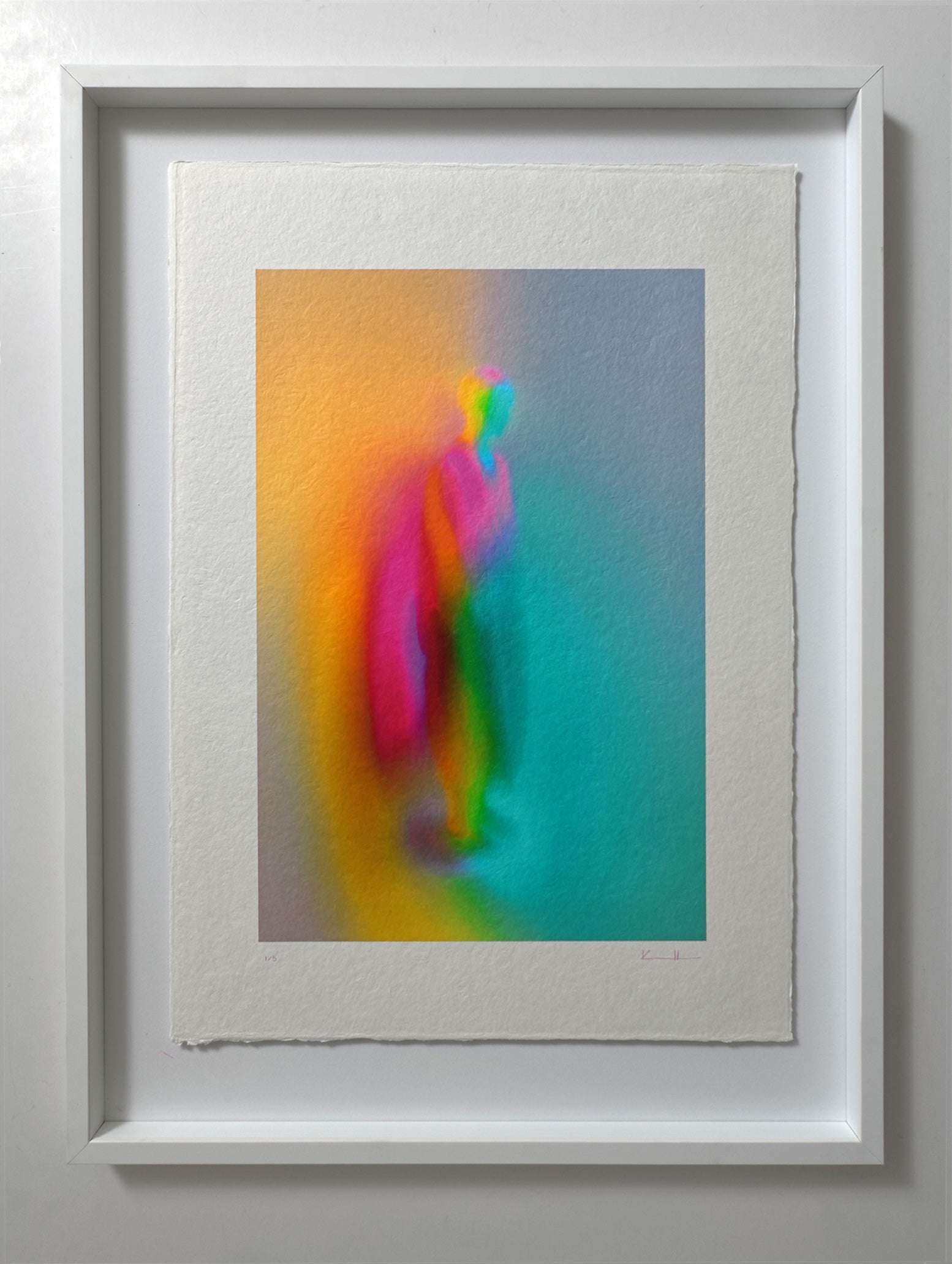What Comes Back by Atelier Kalle Hellzén, hand-signed and numbered Limited Edition of 5, shown in a white frame on a pale wall. The print floats inside the mount, deckle edges visible, the figure rising through bands of orange, pink and teal. Giclée on handmade kozo washi.