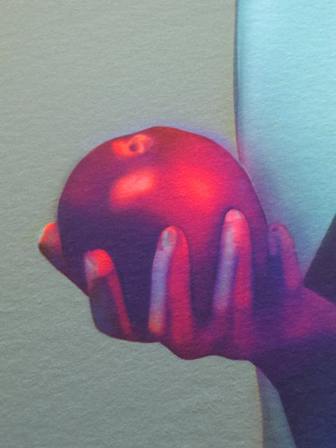 Becoming, detail of the hand and apple