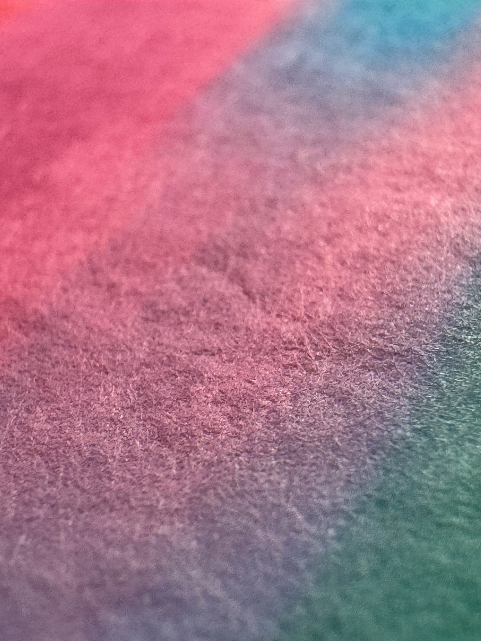 Surface detail of What Comes Back by Atelier Kalle Hellzén, a close field of the print where teal and grey meet the deckled fibre of the handmade paper. Giclée on handmade kozo washi.