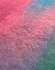 Surface detail of What Comes Back by Atelier Kalle Hellzén, a close field of the print where teal and grey meet the deckled fibre of the handmade paper. Giclée on handmade kozo washi.